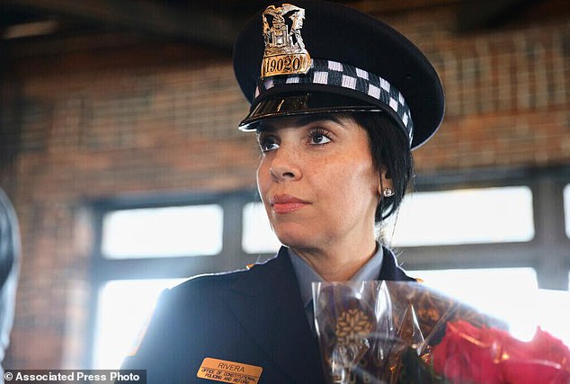 Body cam footage shows Chicago officer fatally shooting partner during apartment pursuit.