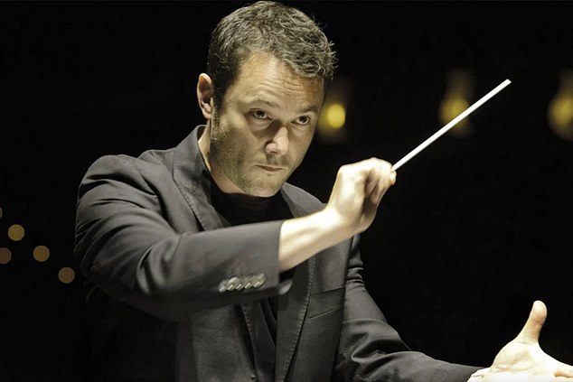 Conductor accidentally knocks £1m violin from violinist's hands during live performance.