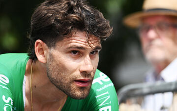 Italian cyclist expelled from Giro d'Italia after violent headbutt crash.